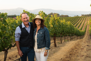 Kim Stare Wallace and Don Wallace in the vineyard